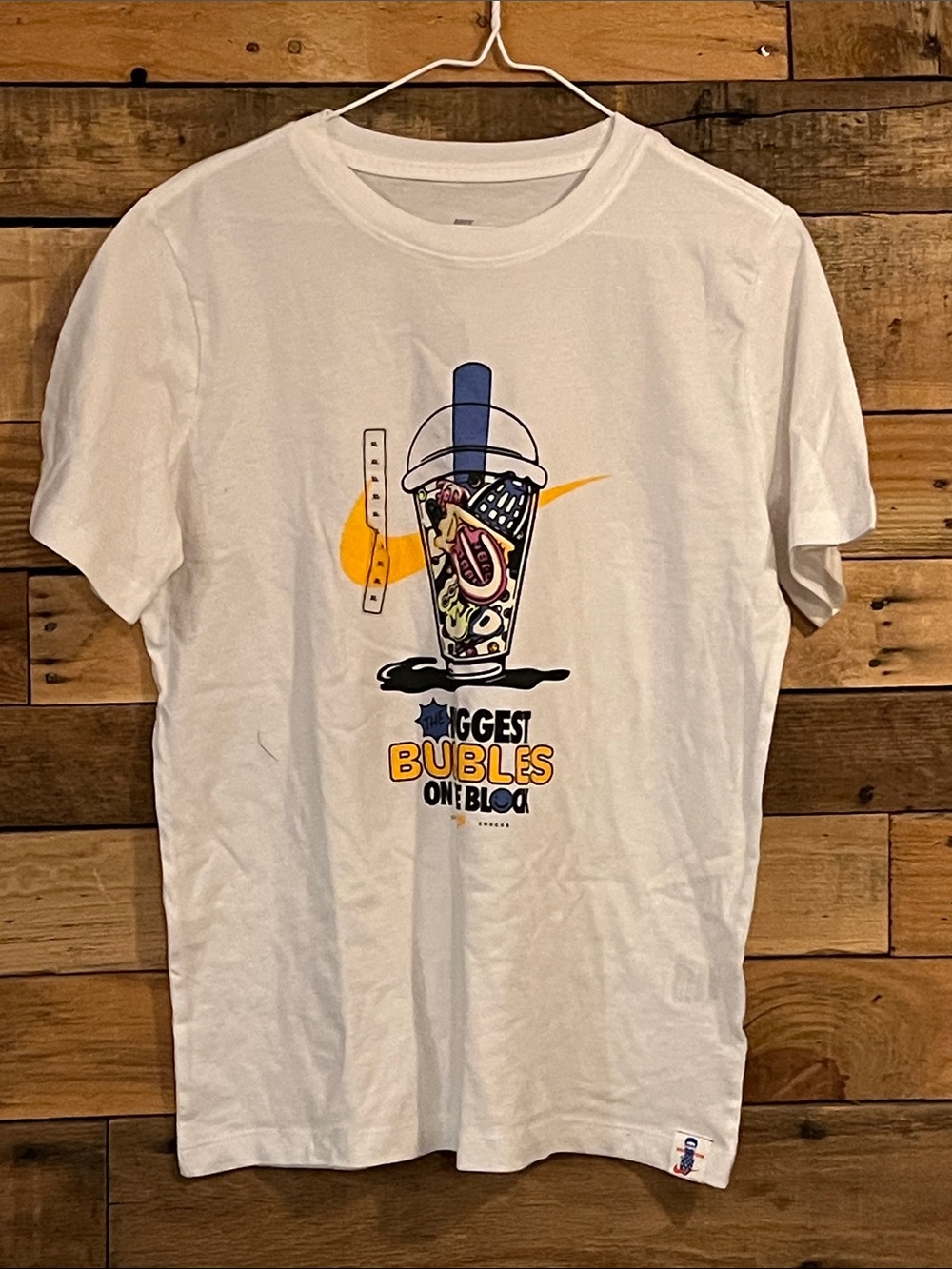 Nike White Graphic Tee with Blue and Yellow Bubble Drink Print